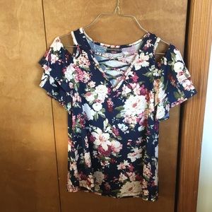 Floral top colors blue, pink, and green